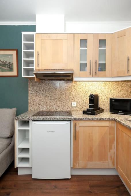 Elegant Appartement Aux Portes De Paris Сент-Уен Екстериор снимка